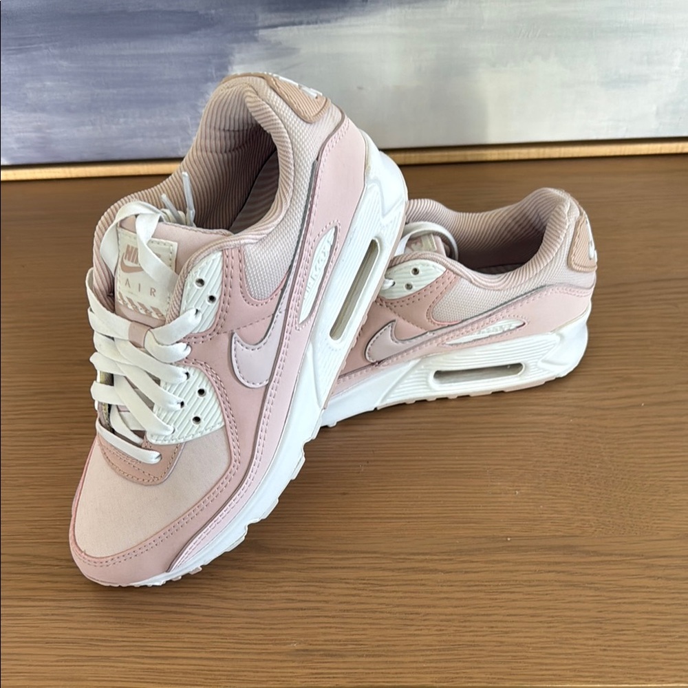 Nike Pink and White Sneakers with Classic Silhouette